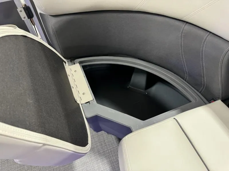 Slide: The Image of Open storage compartment in 2025 Mirage Cruise 8520 CRS boat seat. - 16