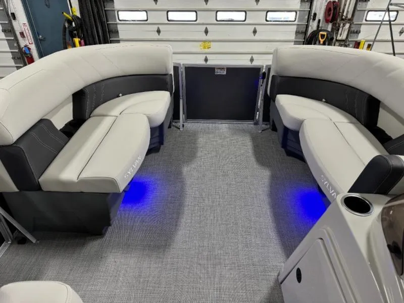 Slide: The Image of Luxurious interior of 2025 Mirage Cruise 8520 CRS pontoon boat with LED lighting. - 24