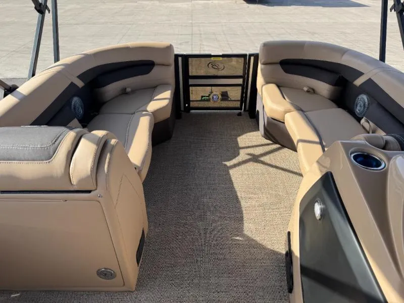 Slide: The Image of Luxurious interior of 2025 Cabrio Ultra-Entertainer C24UE pontoon boat with plush seating. - 28