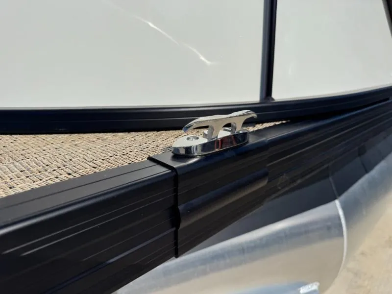 Slide: The Image of Close-up of Cabrio Ultra-Entertainer C24UE boat cleat, 2025 model, on sleek black trim. - 5