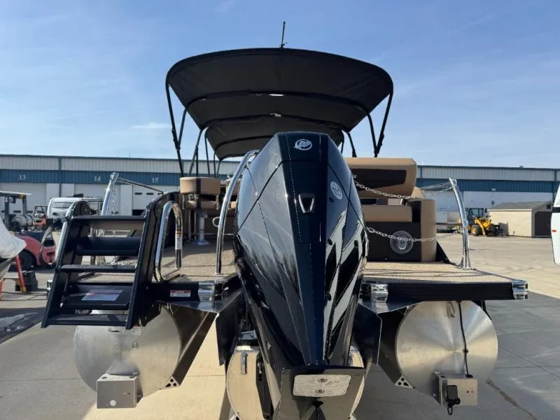 Slide: The Image of 2025 Cabrio Ultra-Entertainer C24UE pontoon boat with sleek design and powerful engine. - 9