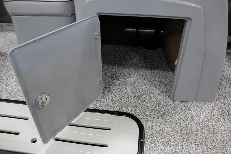 Slide: The Image of Open storage compartment on 2025 Veranda Fish VF22F4 boat, featuring gray interior and flooring. - 15