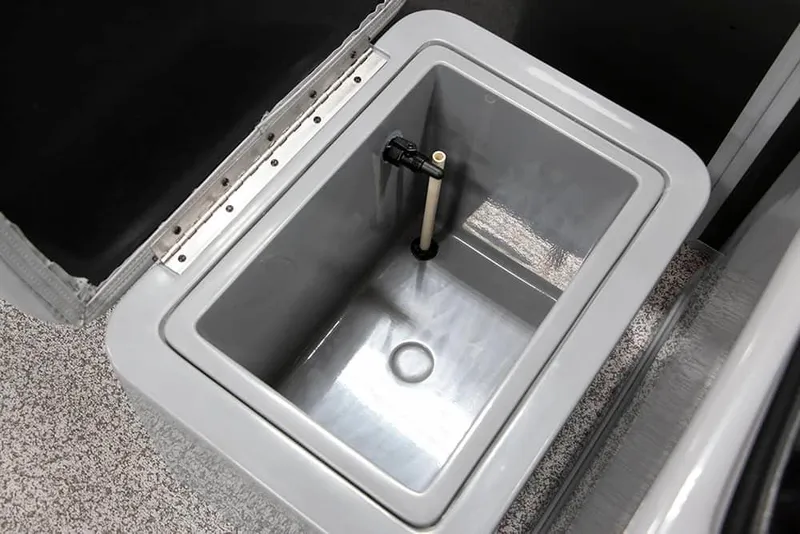 Slide: The Image of 2025 Veranda Fish VF22F4 livewell, featuring a sleek, rectangular design with a drain and aerator. - 17