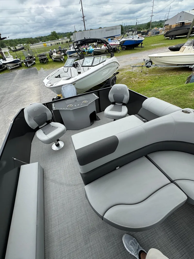 Slide: The Image of 2025 Veranda Fish VF22F4 pontoon boat with modern seating and sleek design. - 2