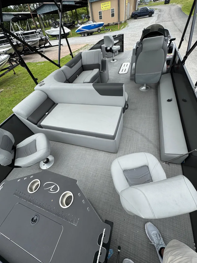 Slide: The Image of 2025 Veranda Fish VF22F4 pontoon boat interior with gray seating and modern design. - 4