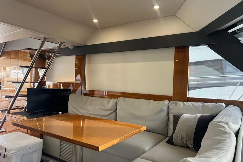 Slide: The Image of Luxurious interior of 2020 Maritimo M51 yacht with cozy seating and modern decor. - 100