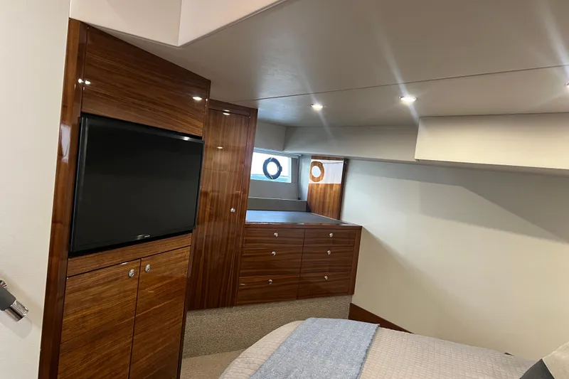 Slide: The Image of Luxurious interior of 2020 Maritimo M51 yacht with wood paneling and modern amenities. - 110