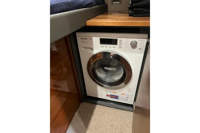Slide: The Image of Miele washing machine in 2020 Maritimo M51 yacht interior. - 117