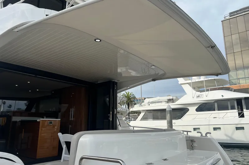 Slide: The Image of 2020 Maritimo M51 yacht with spacious deck and modern interior at marina. - 81