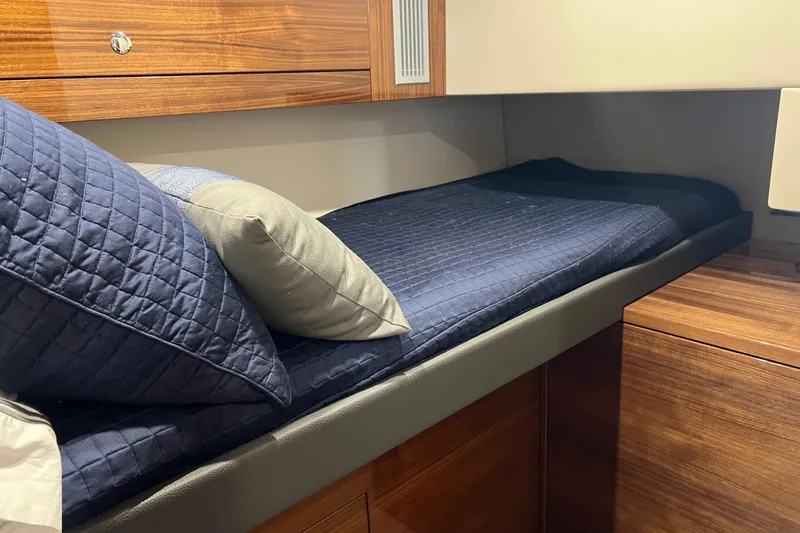 Slide: The Image of Luxurious cabin interior of 2020 Maritimo M51 yacht with cozy bedding. - 83