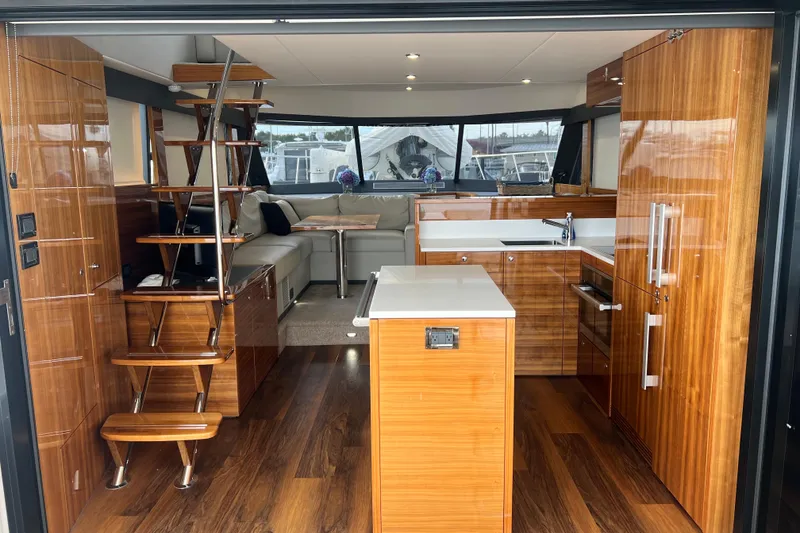 Slide: The Image of Luxurious interior of 2020 Maritimo M51 yacht with modern kitchen and wooden finishes. - 85