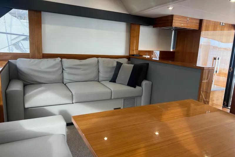 Slide: The Image of Luxurious interior of 2020 Maritimo M51 yacht with modern sofa and wooden accents. - 87