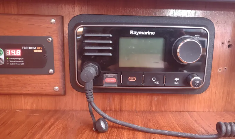 Slide: The Image of Raymarine radio system on 1990 Beneteau Oceanis 390 yacht dashboard. - 49