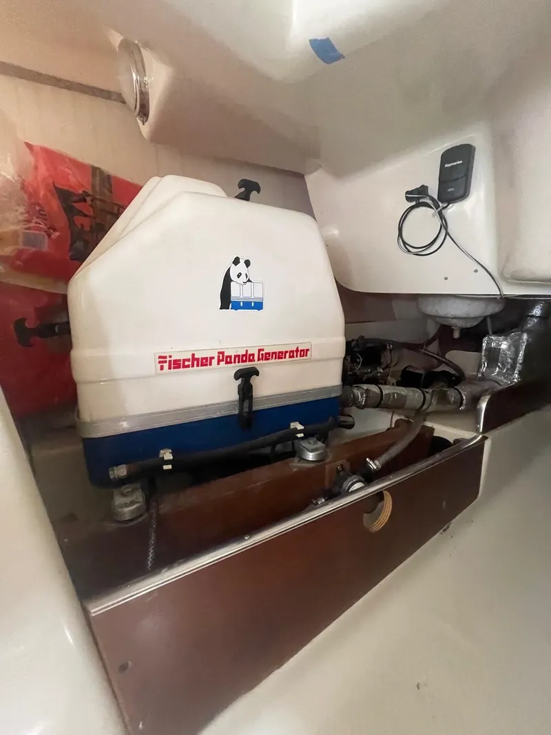 Slide: The Image of Fischer Panda generator inside a 2005 Hake Seaward 32RK boat compartment. - 23