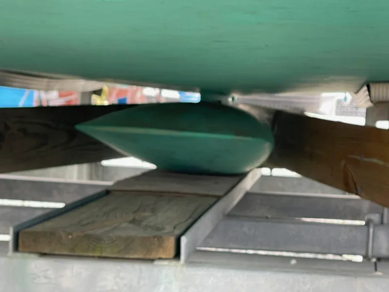 Slide: The Image of Bottom view of a 2005 Hake Seaward 32RK sailboat hull on a wooden support. - 29
