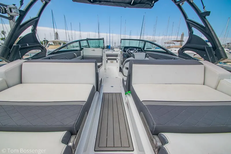 Slide: The Image of 2018 Monterey MX6 Surf Edition boat interior with spacious seating and sleek design. - 20