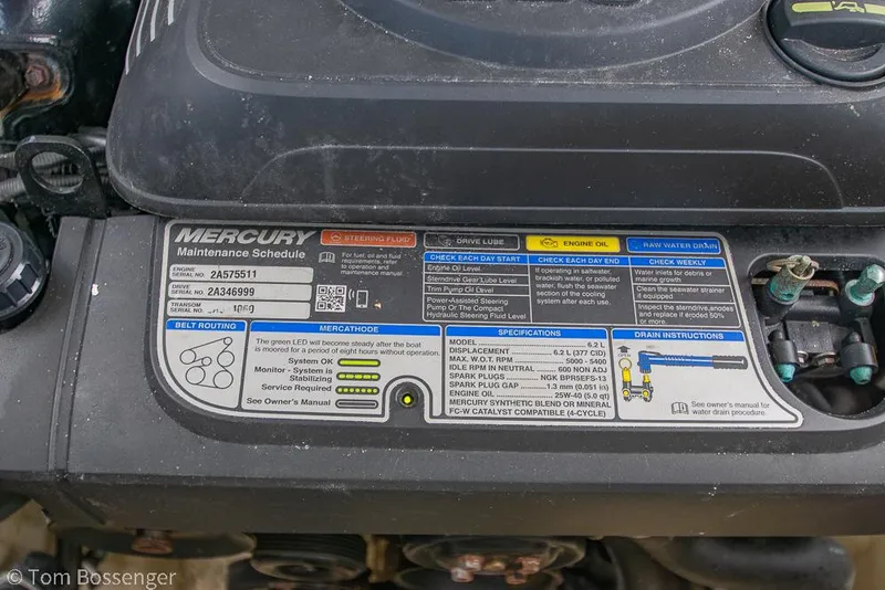 Slide: The Image of Engine maintenance schedule label on a 2018 Monterey MX6 Surf Edition boat. - 26