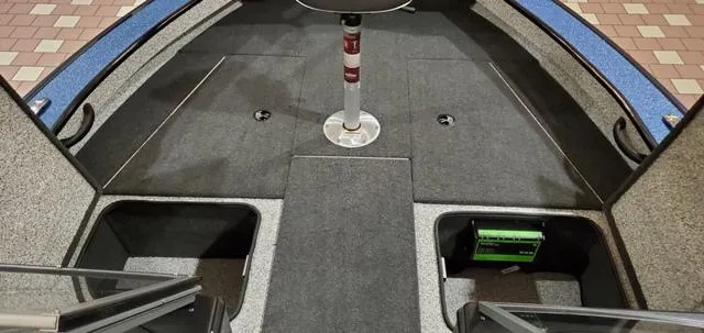 Slide: The Image of 2023 Polar Kraft Kodiak Sport 185 FS boat interior with storage compartments. - 10