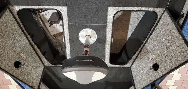 Slide: The Image of 2023 Polar Kraft Kodiak Sport 185 FS boat interior with storage compartments and seating. - 11