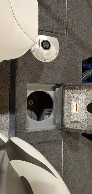 Slide: The Image of 2023 Polar Kraft Kodiak Sport 185 FS boat interior with storage compartment. - 17