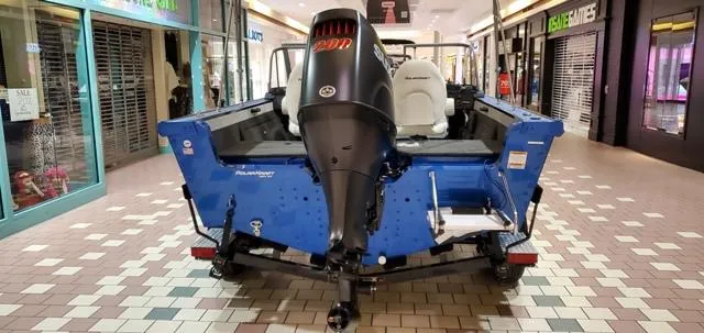 Slide: The Image of 2023 Polar Kraft Kodiak Sport 185 FS boat displayed indoors, rear view. - 4