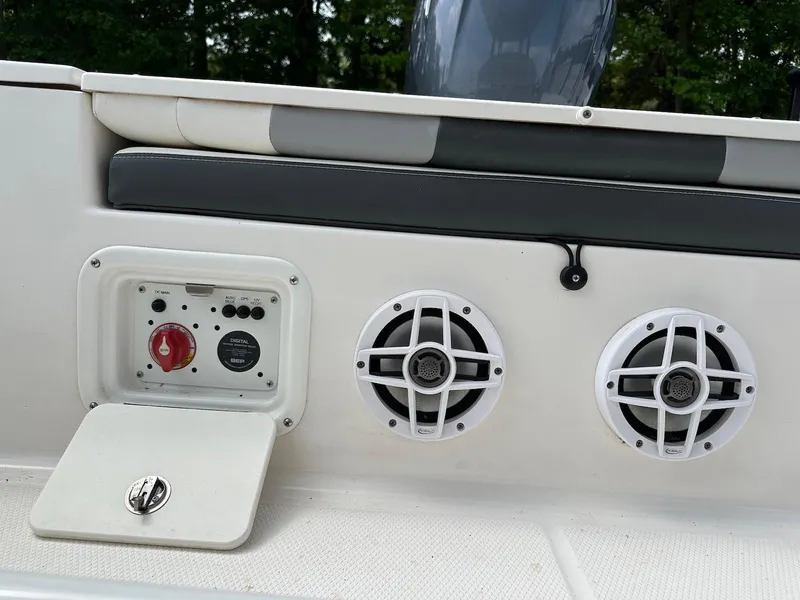 Slide: The Image of 2023 Robalo 226 Cayman boat control panel with speakers, featuring modern design and functionality. - 17