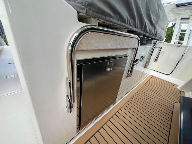 Slide: The Image of 2023 Tiara Yachts 38 LS, sleek stainless steel detailing, modern deck design. - 15