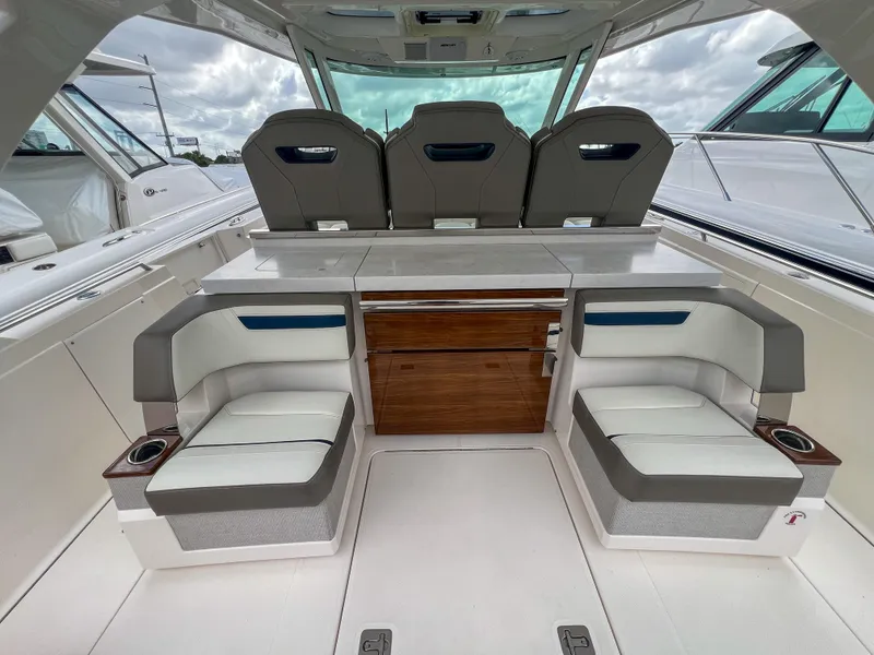 Slide: The Image of 2023 Tiara Yachts 38 LS interior with luxurious seating and modern design. - 20