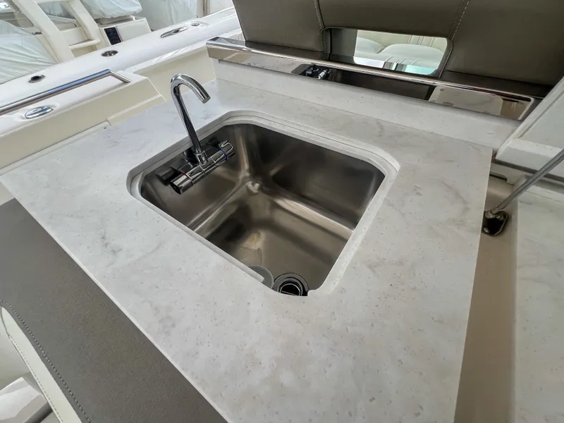 Slide: The Image of Luxury yacht sink with modern faucet on Tiara Yachts 2023 model 38 LS. - 23