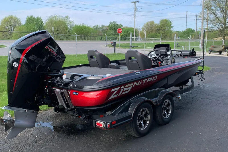 Slide: The Image of 2019 Nitro Z19 Pro boat with trailer, parked outdoors on a paved surface. - 4