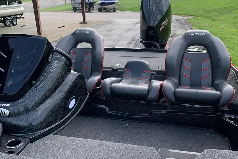 Slide: The Image of 2019 Nitro Z19 Pro boat interior with three seats and sleek design. - 7