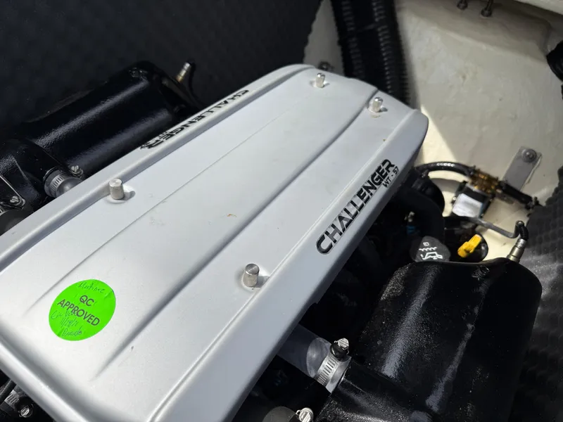 Slide: The Image of Engine compartment of 2022 Heyday WT-2DC with Challenger cover and QC approved sticker. - 31