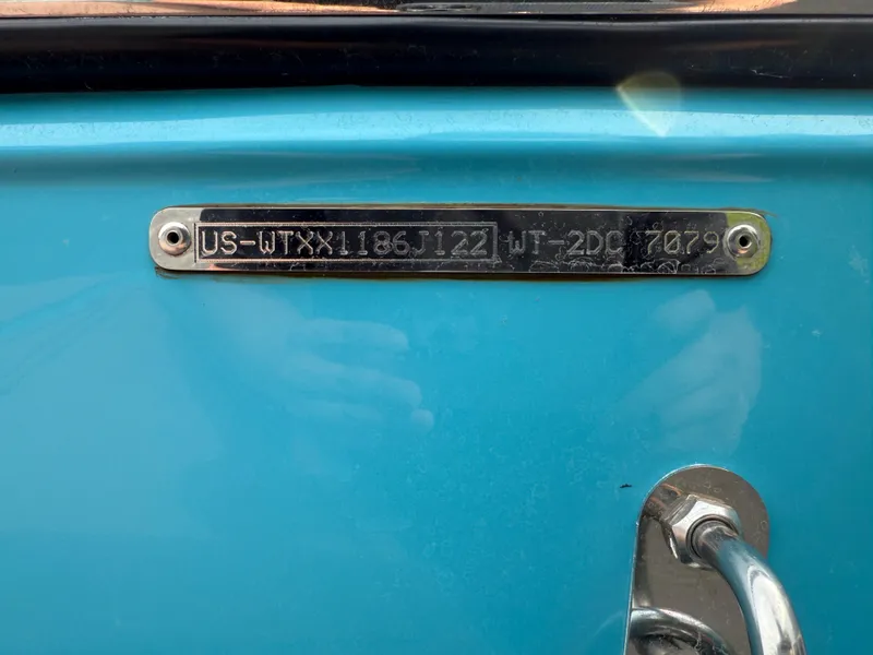 Slide: The Image of 2022 Heyday WT-2DC boat identification plate on blue surface. - 32