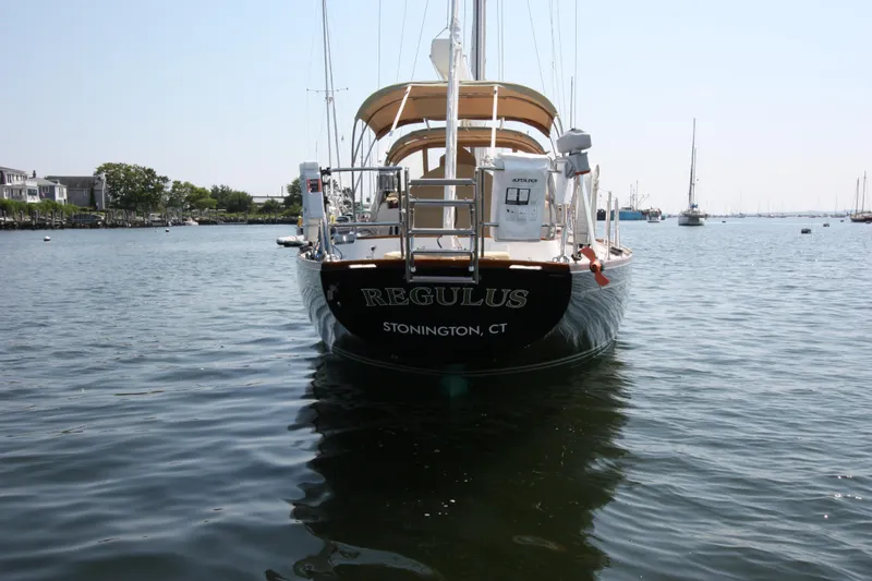 Slide: The Image of Hinckley Sou'wester 51 sailboat, 1993 model, docked in calm waters, Stonington, CT. - 6