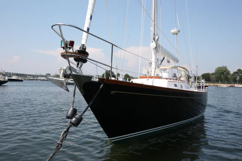 Slide: The Image of Sailing yacht Hinckley Sou'wester 51, 1993 model, anchored in calm waters. - 8