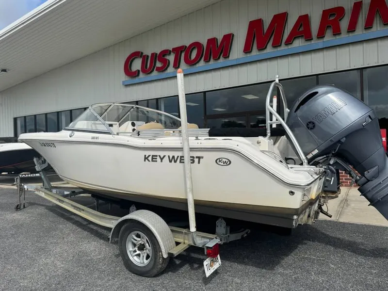 Slide: The Image of 2016 Key West 203 DFS boat on trailer outside Custom Marine store. - 8