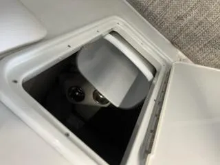 Slide: The Image of 2016 Crownline E4 boat storage compartment with open hatch. - 4