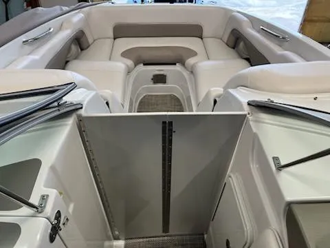 Slide: The Image of 2016 Crownline E4 boat interior with spacious seating and modern design. - 5