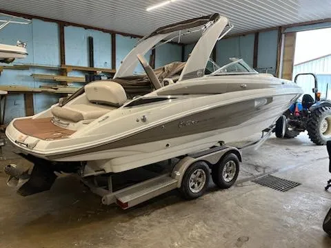 Slide: The Image of 2016 Crownline E4 boat on trailer in indoor storage facility. - 8