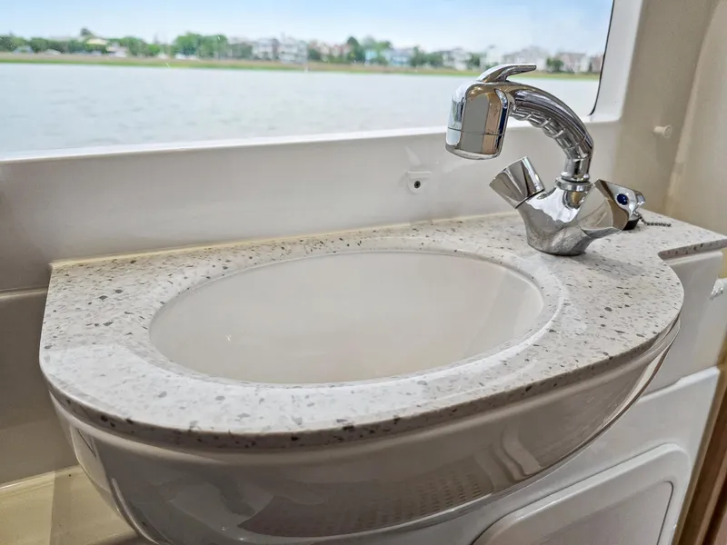 Slide: The Image of Modern sink with chrome faucet on Aquila 36 Sport yacht, 2020 model. - 26