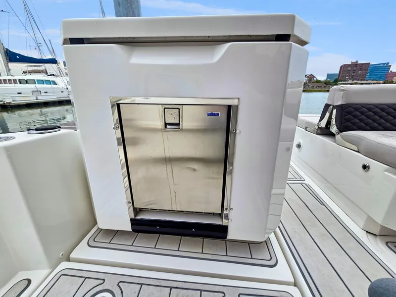 Slide: The Image of Aquila 36 Sport 2020 boat with built-in stainless steel refrigerator on deck. - 29