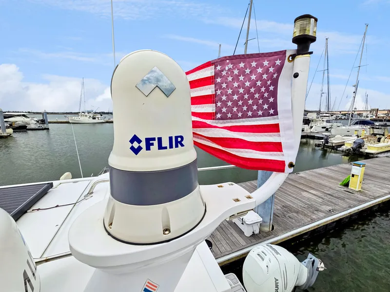 Slide: The Image of Aquila 36 Sport 2020 with FLIR system and American flag at marina. - 49