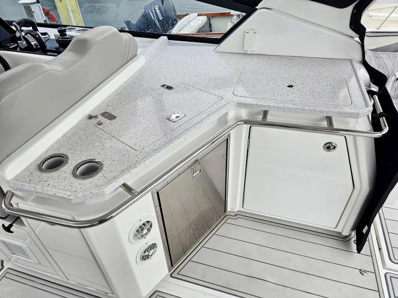 Slide: The Image of 2020 Aquila 36 Sport yacht interior with sleek countertop and storage cabinets. - 6