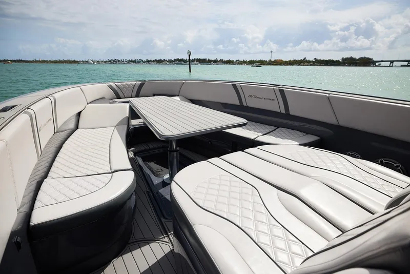 Slide: The Image of Luxurious seating on 2023 Midnight Express 37' Open boat, with elegant quilted upholstery. - 12