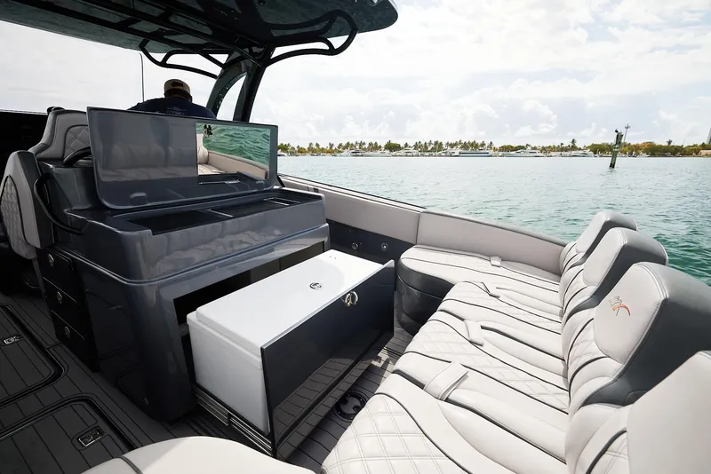 Slide: The Image of 2023 Midnight Express 37' Open boat interior with luxurious seating and ocean view. - 15