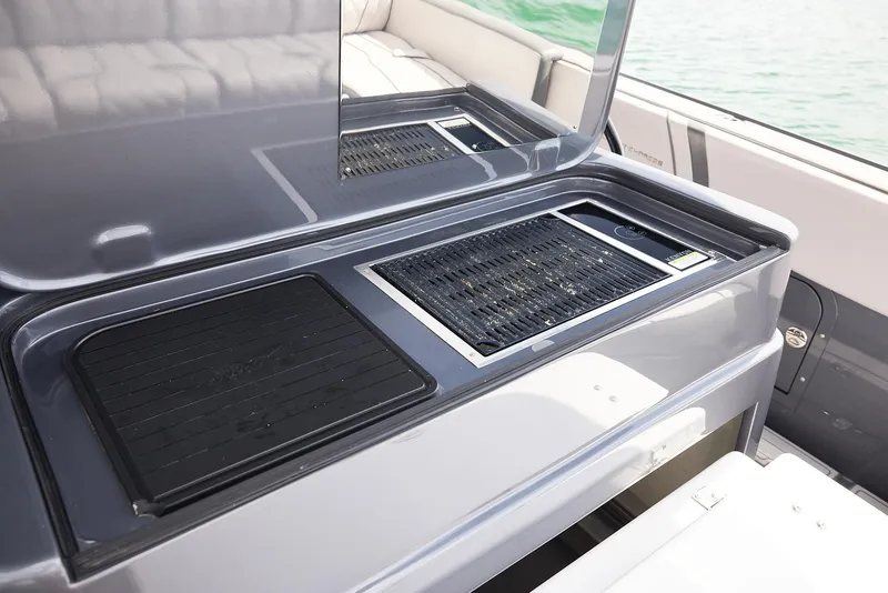 Slide: The Image of 2023 Midnight Express 37' Open boat interior with sleek kitchen area and modern design. - 16