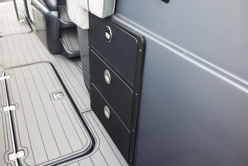 Slide: The Image of 2023 Midnight Express 37' Open boat interior with sleek storage compartments and modern design. - 17