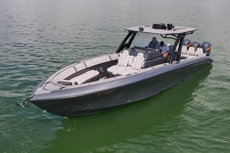 Slide: The Image of 2023 Midnight Express 37' Open boat on calm water. - 7