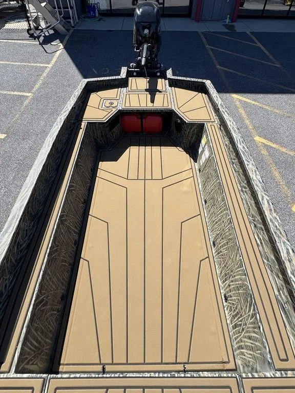 Slide: The Image of 2025 Tracker Grizzly 1650 T Prairie Wings Edition boat, top view, spacious interior design. - 15