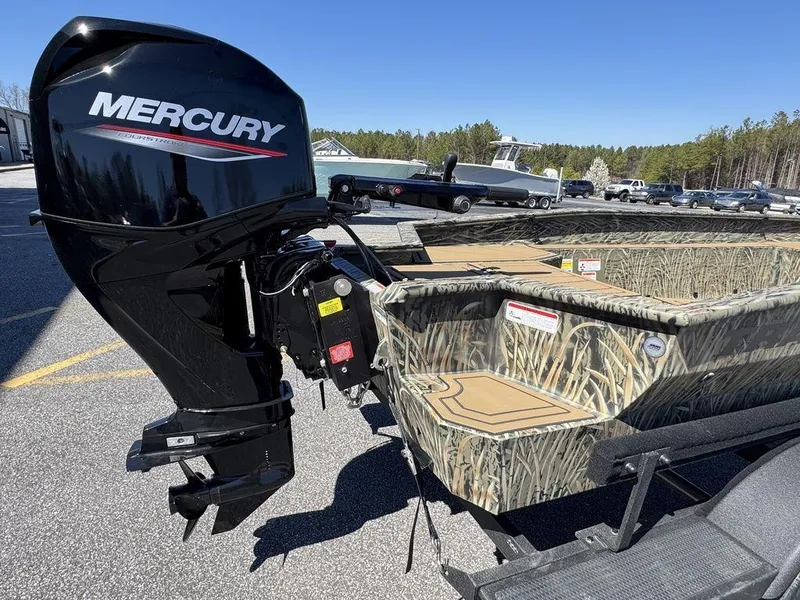 Slide: The Image of 2025 Tracker Grizzly 1650 T Prairie Wings Edition boat with Mercury outboard motor. - 7